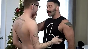 Stepson giving stepdad some christmas gaiety