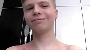 Cute soapy boy alone in a shower
