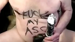 Tonyslave training his male hole with dildo