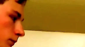 Good looking twink plays with his dick in the shower solo