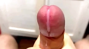 Cumming in close-up with a massive patch of cum in slow motion / big uncut veiny cock / pissing
